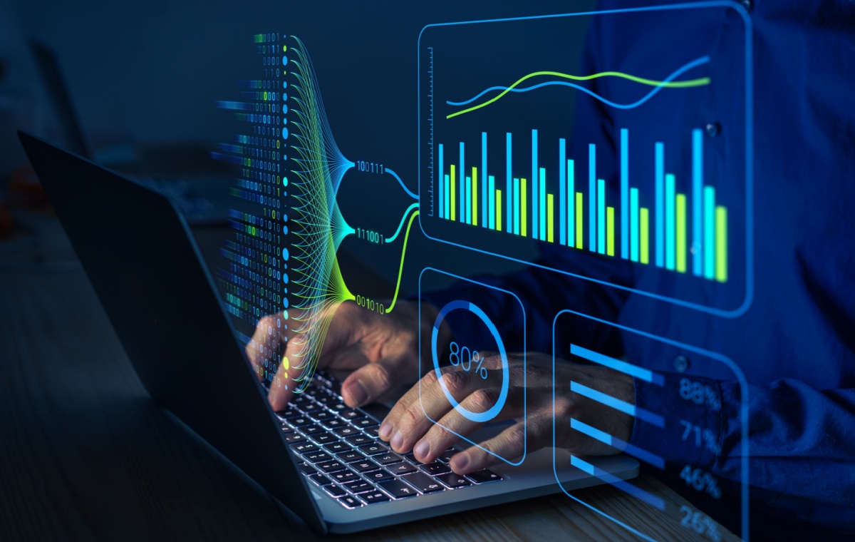 photograph of a man's hands on a laptop keyboard overlaid with a depiction of a screen filled with B2B marketing metrics