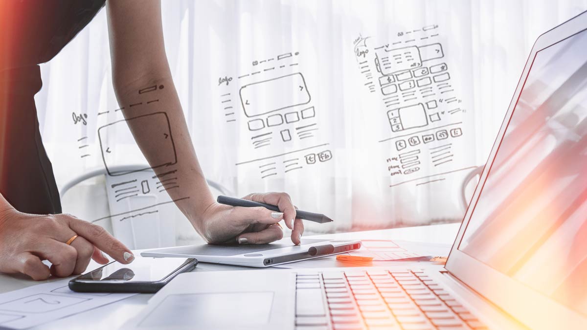 woman determining the cost of different types of websites